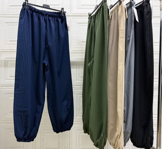 PANTALONE GESSATO CON MOLLA IN CAVIGLIA