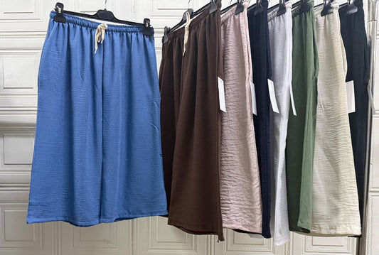 PANTALONE A BERMUDA DI MISTO LINO