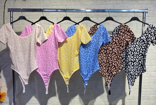 BODY LEOPARDATO CON SCOLLO APERTO