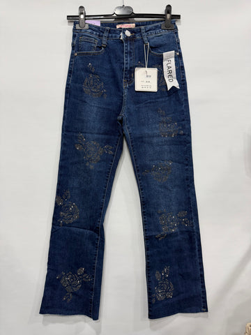 JEANS CON SERIE DI ROSE BRILLANTINATE