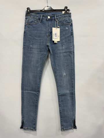 JEANS SKINNY CON CERNIERA IN CAVIGLIA