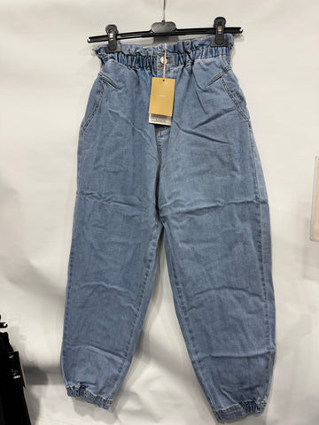 JEANS A CARAMELLA CON MOLLA IN CAVIGLIA