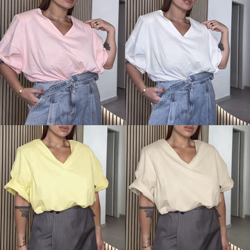 MAGLIA CON SPALLINE SCOLLO A V