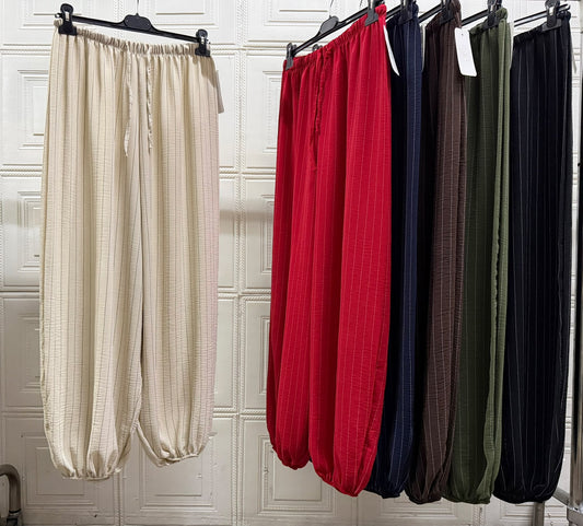 PANTALONE CON MOLLA IN CAVIGLIA RIGATO