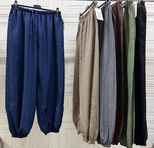PANTALACCIO CON MOLLA IN CAVIGLIA