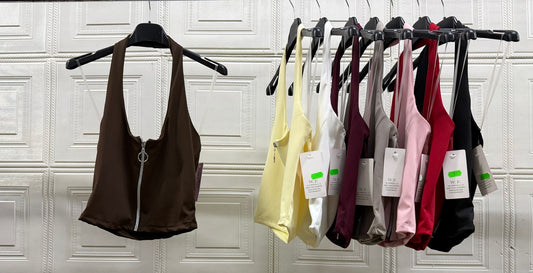 TOP CON ZIP CON SCOLLO LUNGO