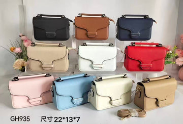 BORSA SBAGLIATA IN ECOPELLE A BAULETTO