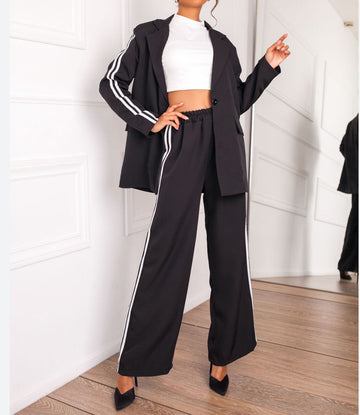 TAILLEUR CON BANDE A LATO