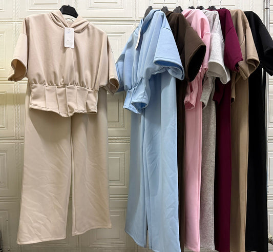 COORDINATO CON MAGLIA ASSIMETRICA MEZZA MANICA